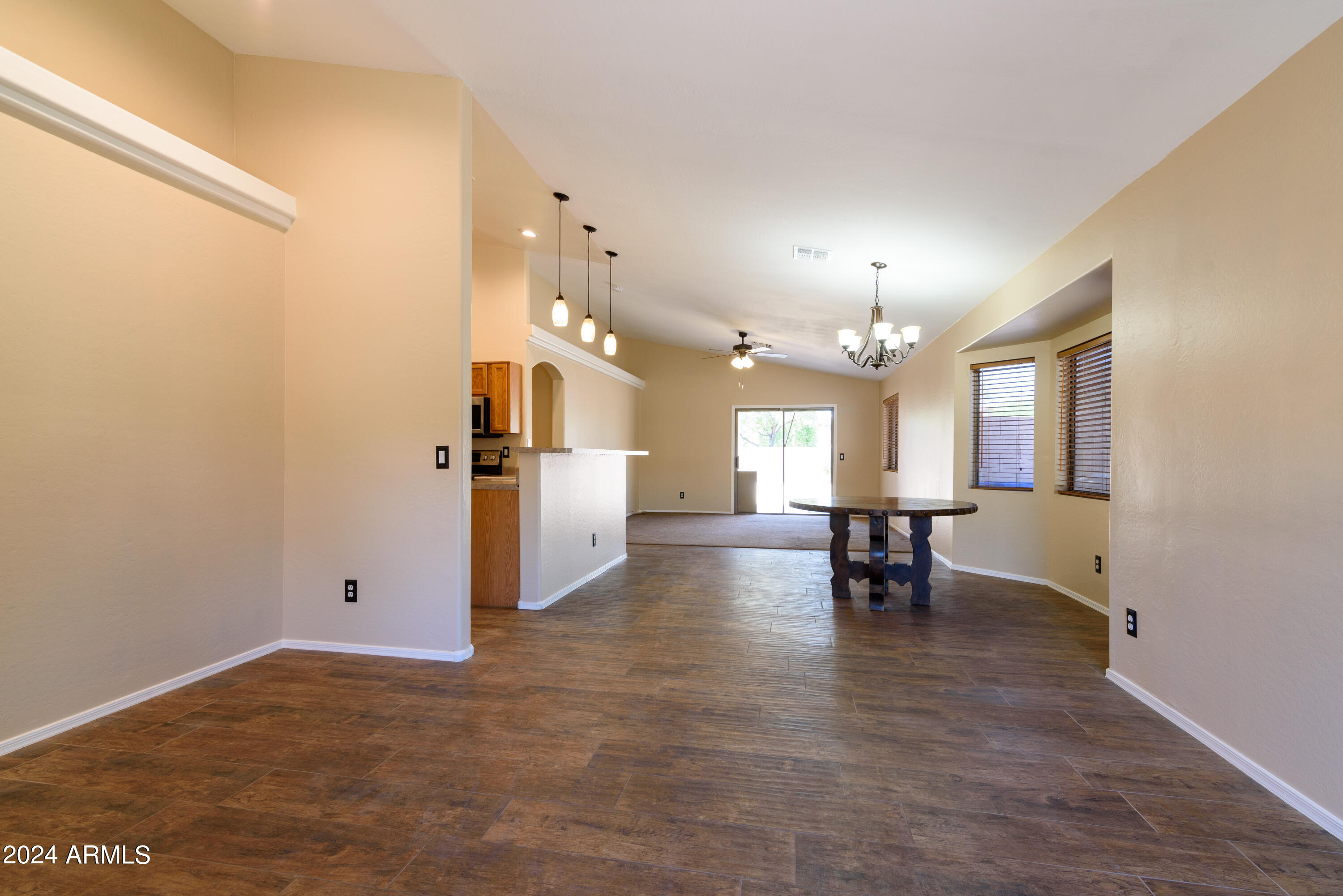 10649 West Monte Vista Road Avondale, AZ 85392 - Photo 10 of 28 a view of a livingroom with furniture and a window