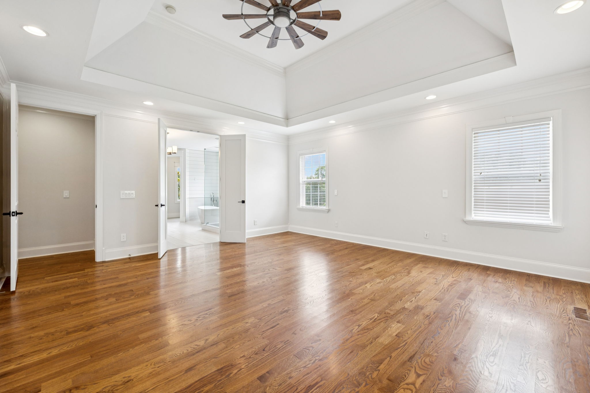 1416 Swindell Hollow Road Lebanon, TN 37090 - Photo 32 of 81 a view of an empty room with a window and wooden floor
