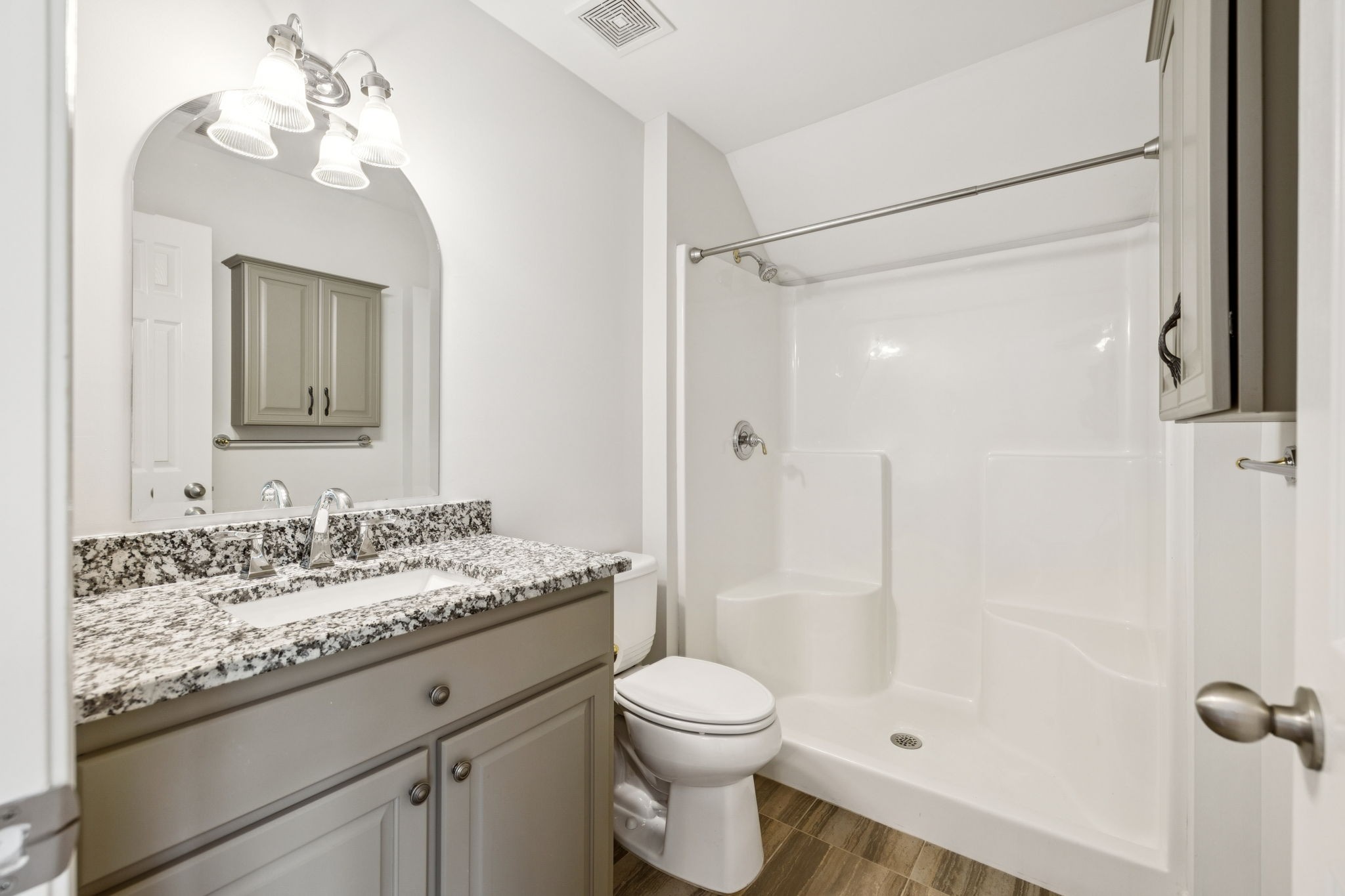 1416 Swindell Hollow Road Lebanon, TN 37090 - Photo 59 of 81 a bathroom with a granite countertop sink toilet and shower