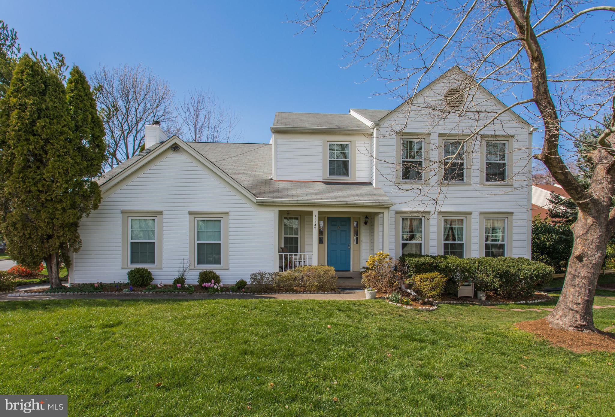 13345 Point Rider Lane Herndon, VA 20171 - Photo 1 of 30 a front view of house with yard and green space