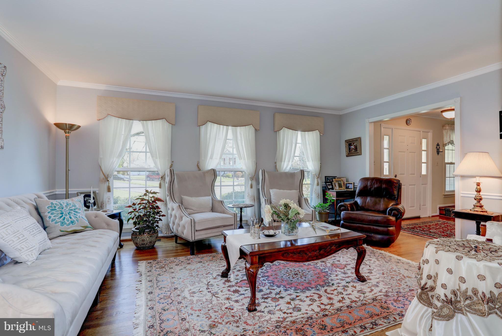 13345 Point Rider Lane Herndon, VA 20171 - Photo 12 of 30 a living room with furniture and wooden floor
