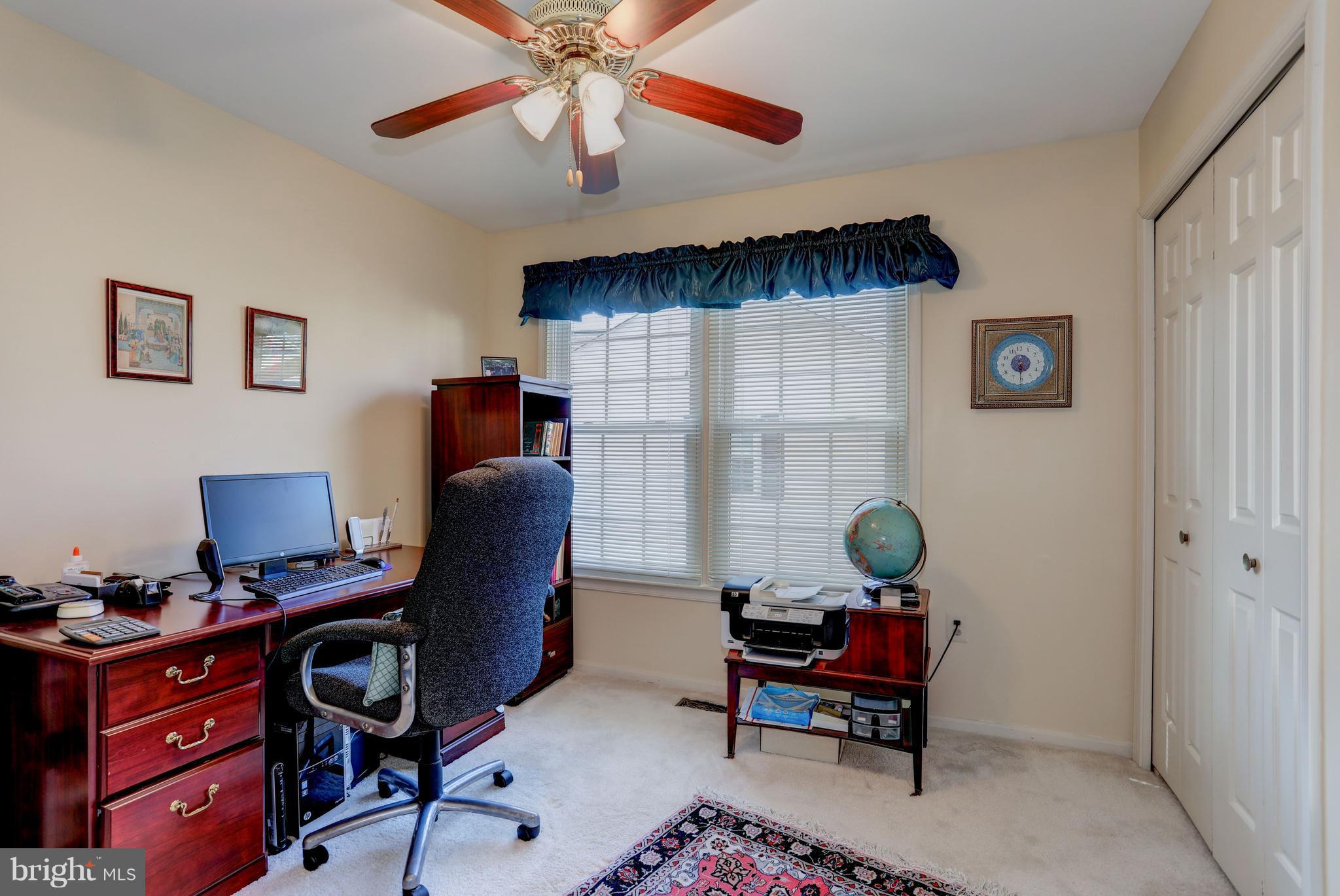 13345 Point Rider Lane Herndon, VA 20171 - Photo 21 of 30 a living room with furniture and a window