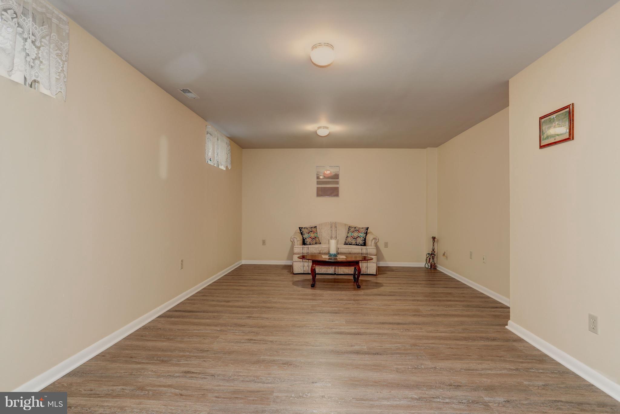 13345 Point Rider Lane Herndon, VA 20171 - Photo 25 of 30 a view of dining room with furniture and wooden floor
