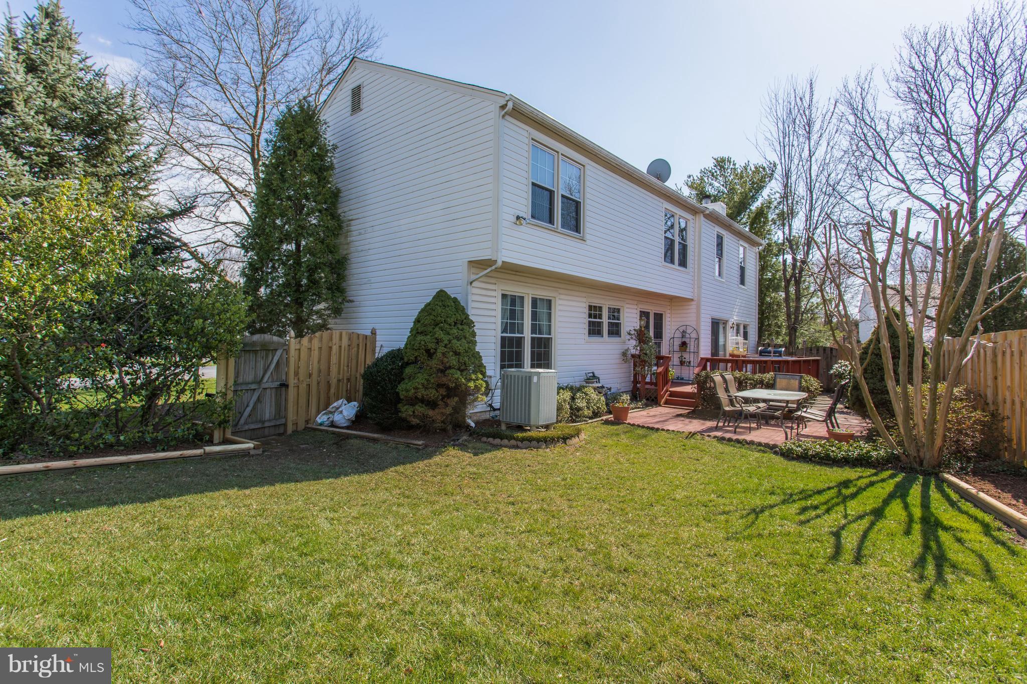 13345 Point Rider Lane Herndon, VA 20171 - Photo 29 of 30 a view of a house with backyard porch and sitting area
