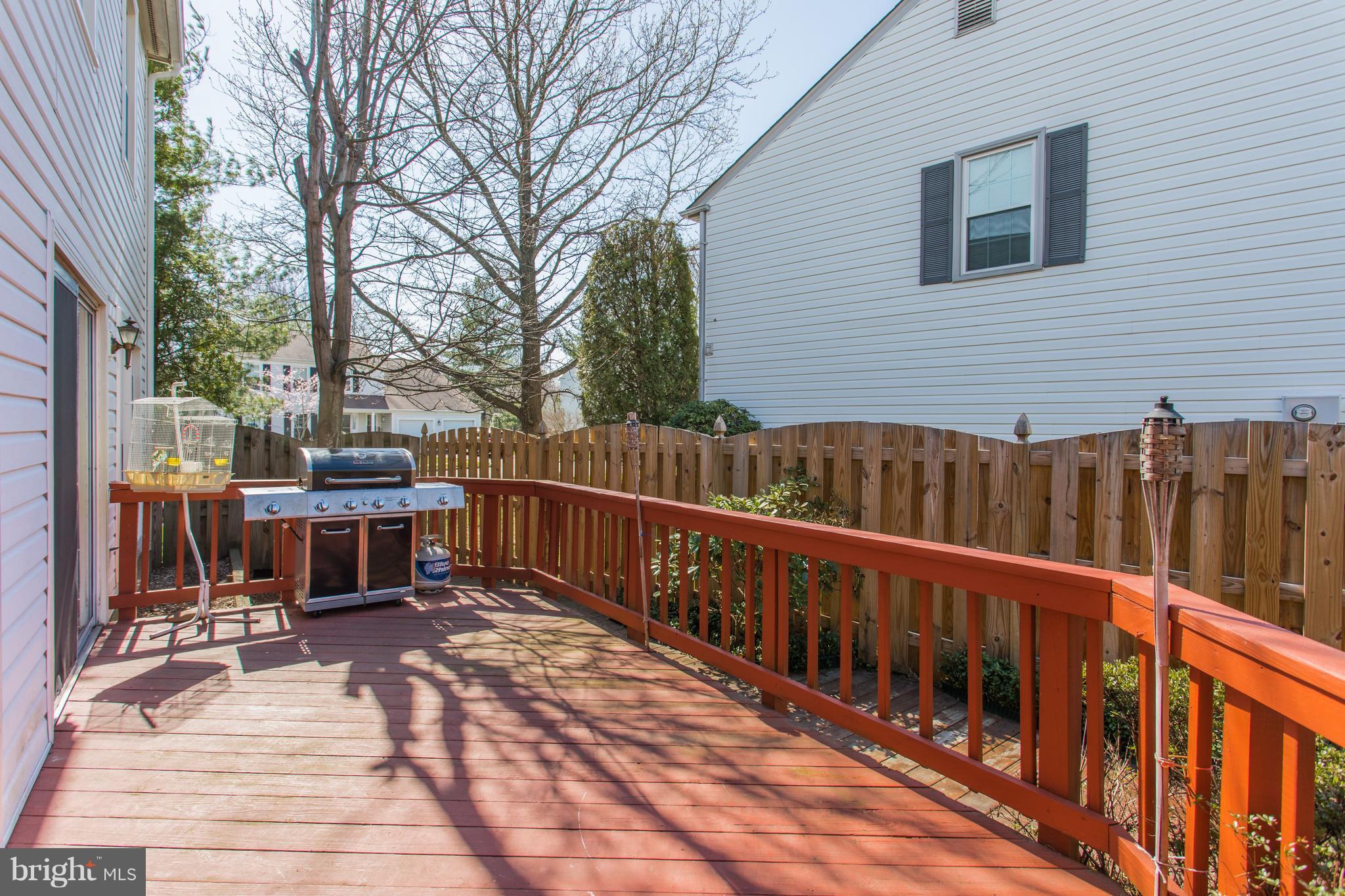 13345 Point Rider Lane Herndon, VA 20171 - Photo 30 of 30 a view of deck with two chairs and wooden fence