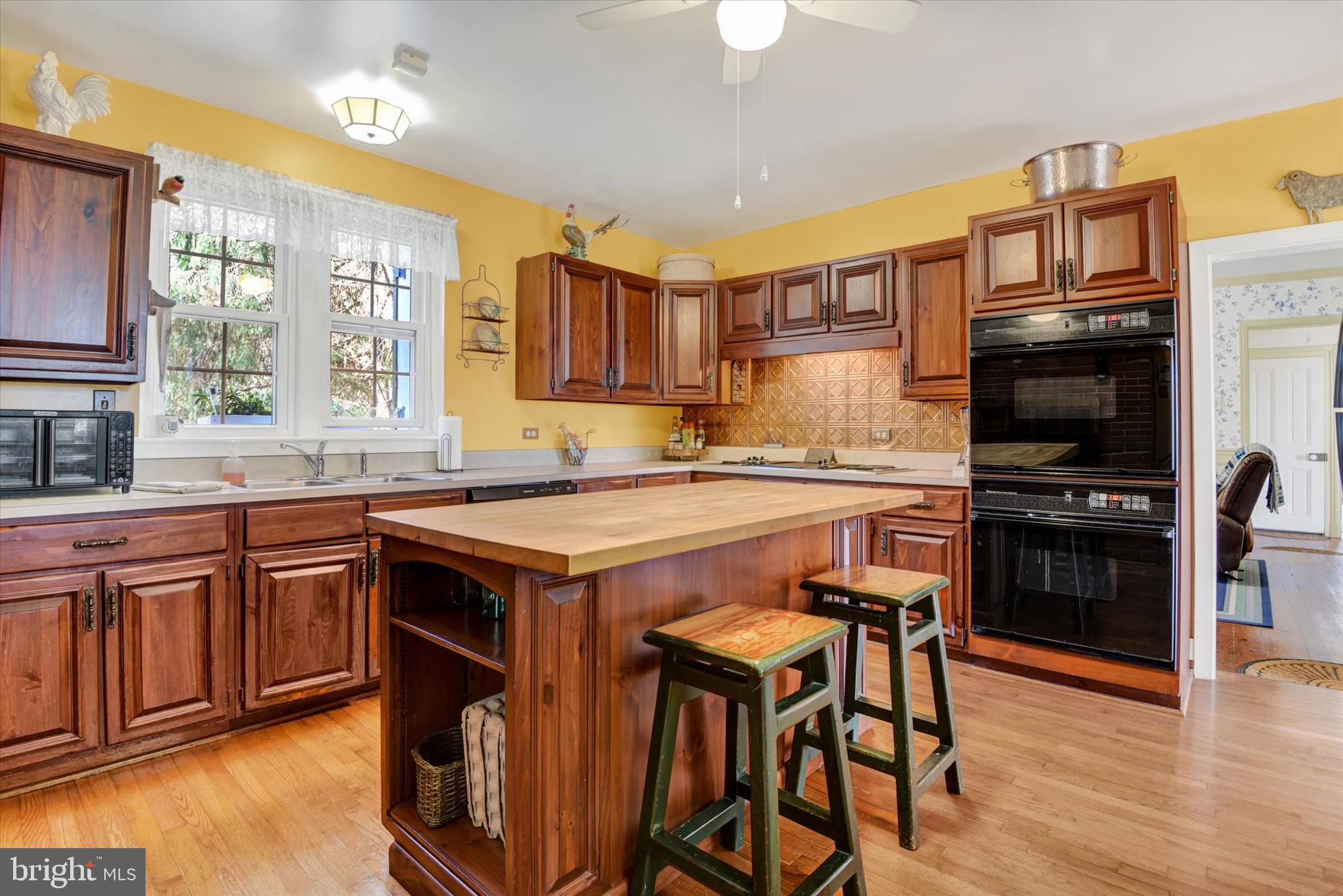 6739 South Clifton Road Frederick, MD 21703 - Photo 16 of 49 a kitchen with stainless steel appliances a stove a sink dishwasher and a refrigerator