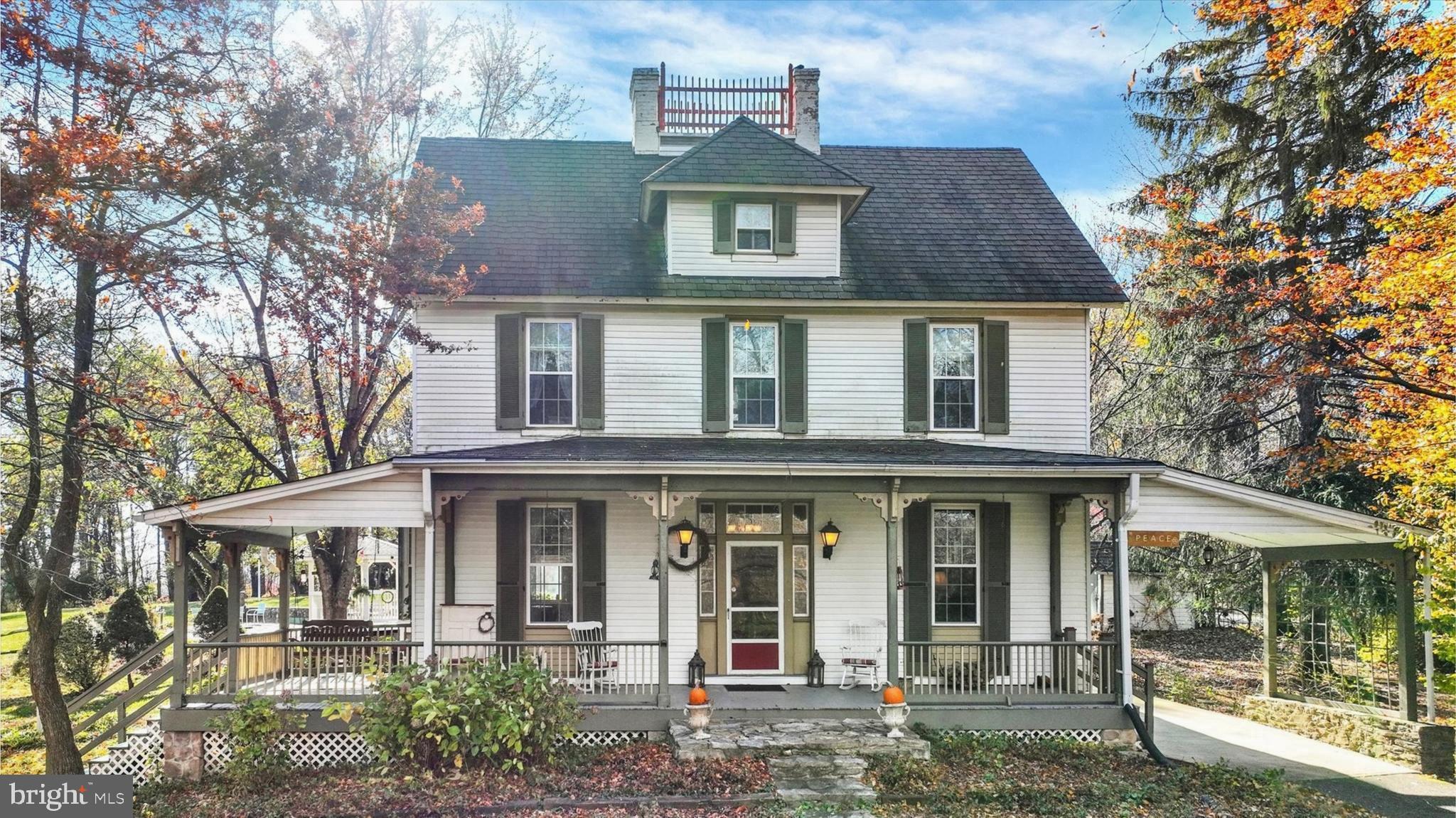 6739 South Clifton Road Frederick, MD 21703 - Photo 2 of 49 front view of a house with a porch