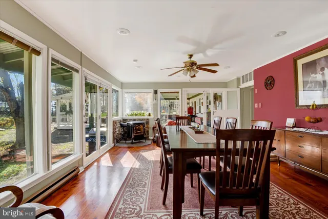 a view of a dining room with furniture window and outside view