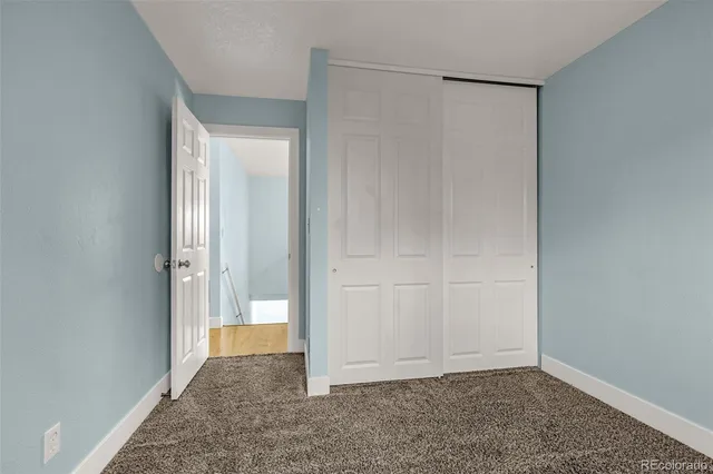 a view of empty room with windows