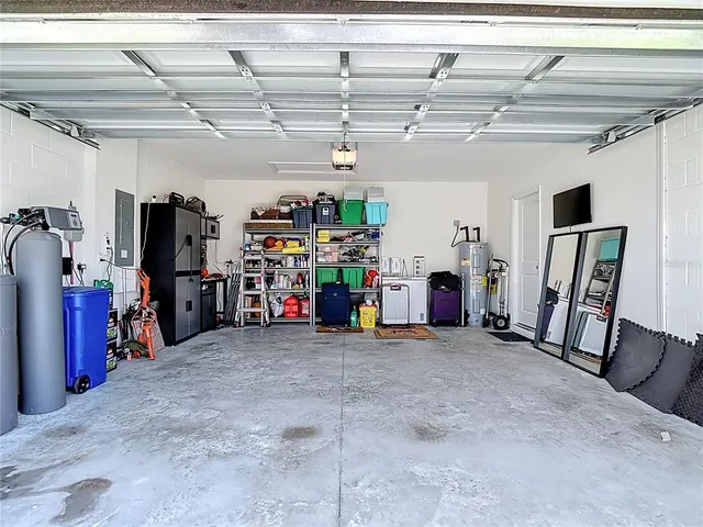 a view of a garage with refrigerator