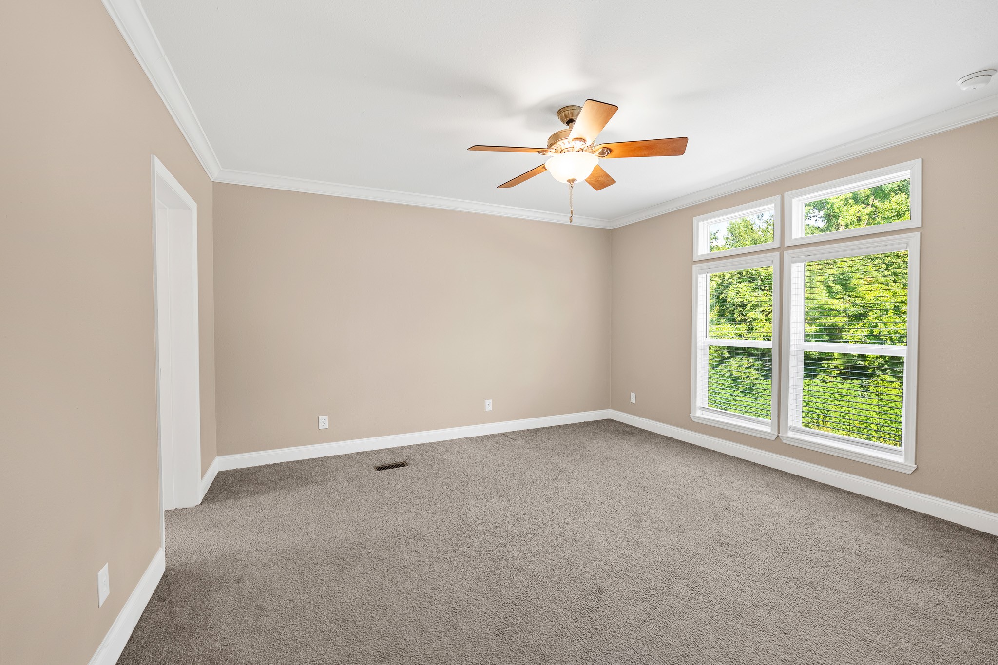 41 Key Largo Loop Point Blank, TX 77364 - Photo 11 of 40 an empty room with windows and chandelier fan