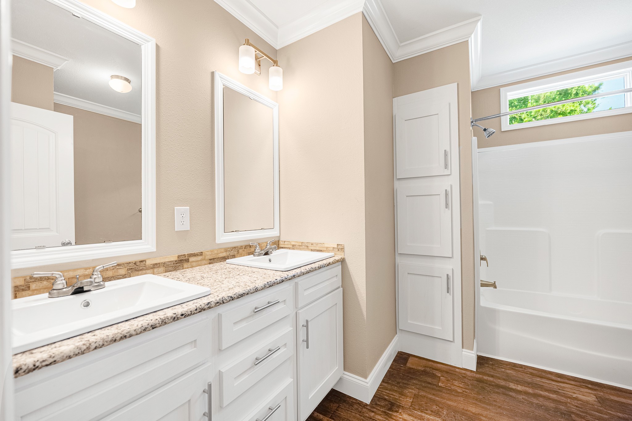 41 Key Largo Loop Point Blank, TX 77364 - Photo 16 of 40 a bathroom with a granite countertop sink and a mirror