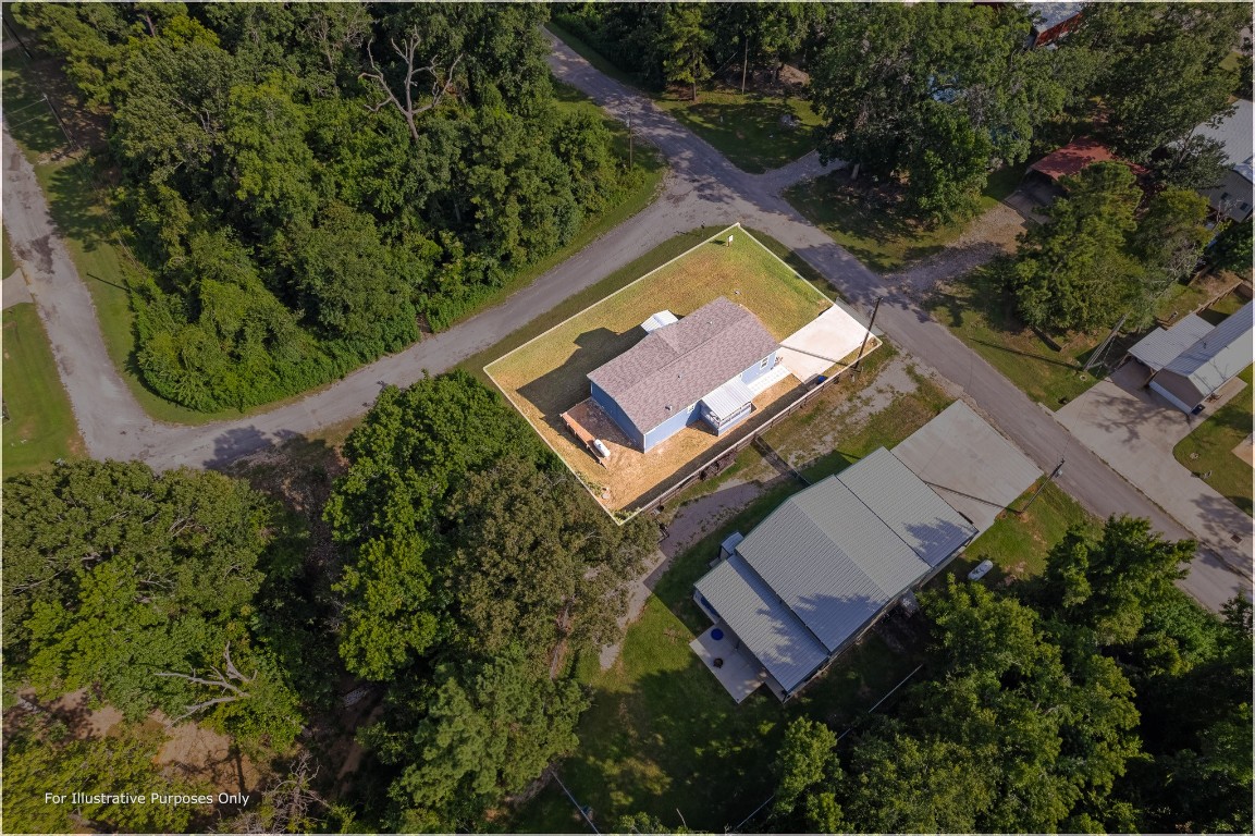 41 Key Largo Loop Point Blank, TX 77364 - Photo 25 of 40 an aerial view of a residential houses with a yard and ocean