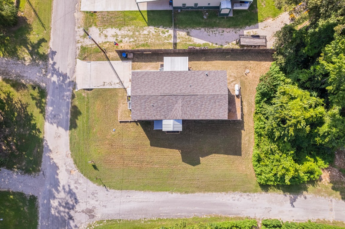 41 Key Largo Loop Point Blank, TX 77364 - Photo 26 of 40 an aerial view of a house with swimming pool and outdoor space
