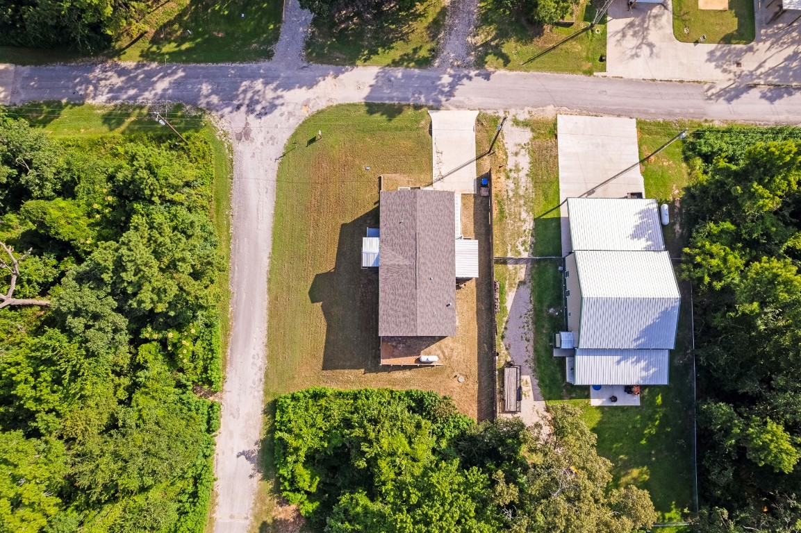 41 Key Largo Loop Point Blank, TX 77364 - Photo 30 of 40 an aerial view of residential house with an outdoor space