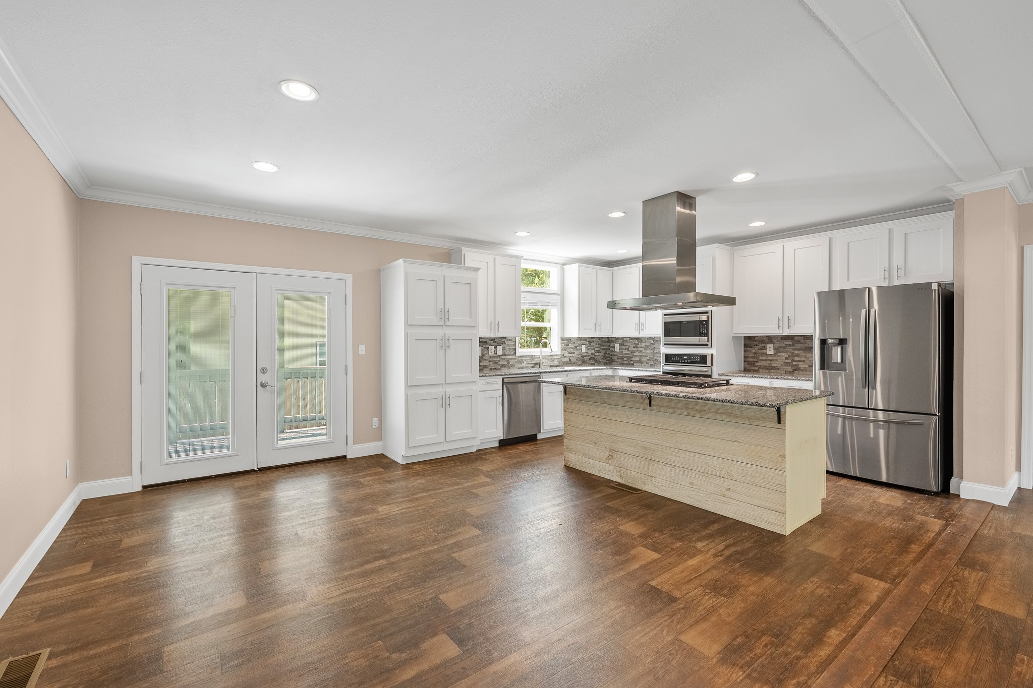 41 Key Largo Loop Point Blank, TX 77364 - Photo 8 of 40 a kitchen with stainless steel appliances a refrigerator sink and cabinets