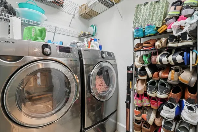 a utility room with dryer and washer