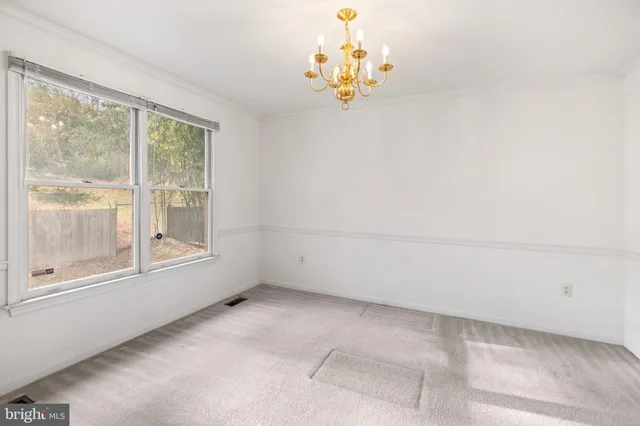 a view of empty room with a window