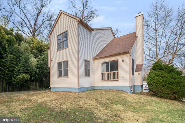 a view of a yard covered with snow in the background