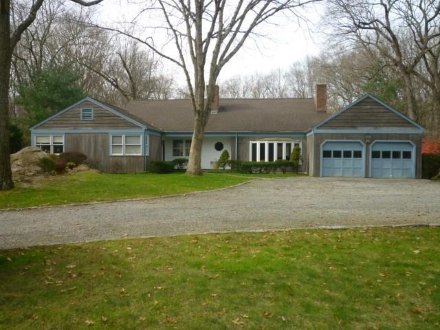 186 Cascade Road Stamford, CT 06903 - Photo 1 of 1 front view of a house with a yard