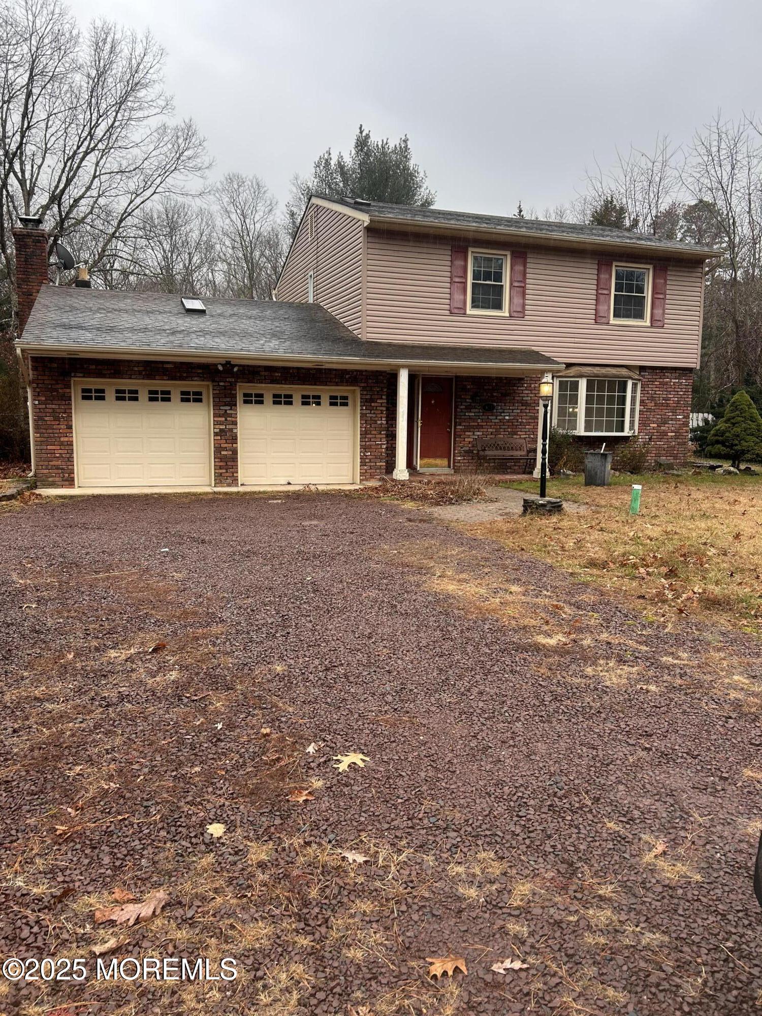 823 Bowman Road Jackson, NJ 08527 - Photo 10 of 27 a front view of a house with yard