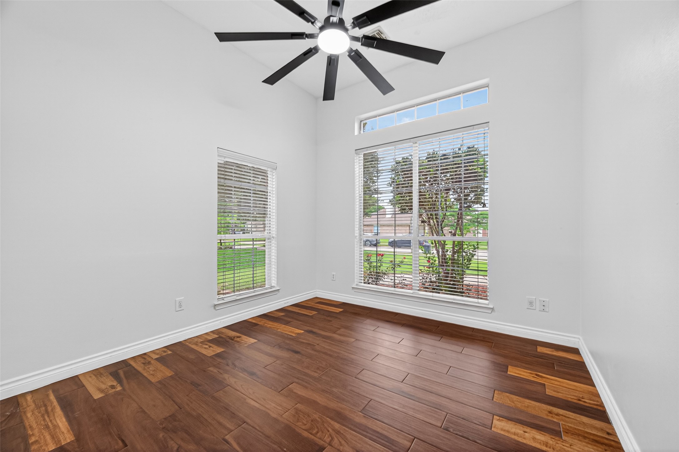 23914 Glengate Drive Spring, TX 77373 - Photo 38 of 49 a view of an empty room with wooden floor and a window