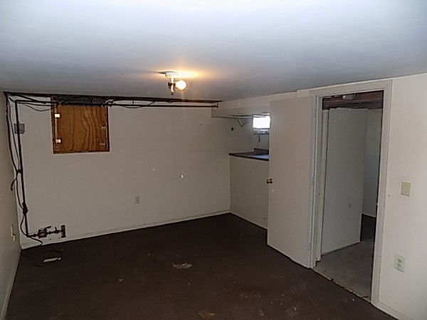 86 Wallace Street Springfield, MA 01119 - Photo 21 of 21 a view of a hallway with wooden floor