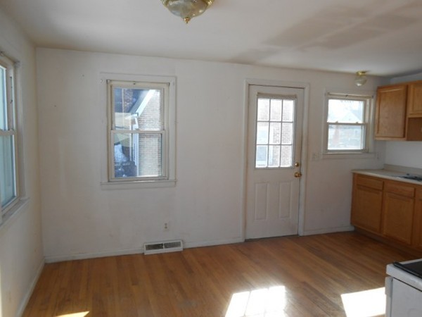 86 Wallace Street Springfield, MA 01119 - Photo 7 of 21 a view of an empty room and window