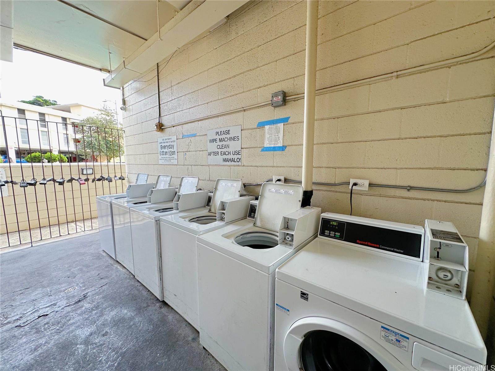 2977 Ala Ilima Street, Unit 809 Honolulu, HI 96818 - Photo 11 of 14 a utility room with dryer and washer
