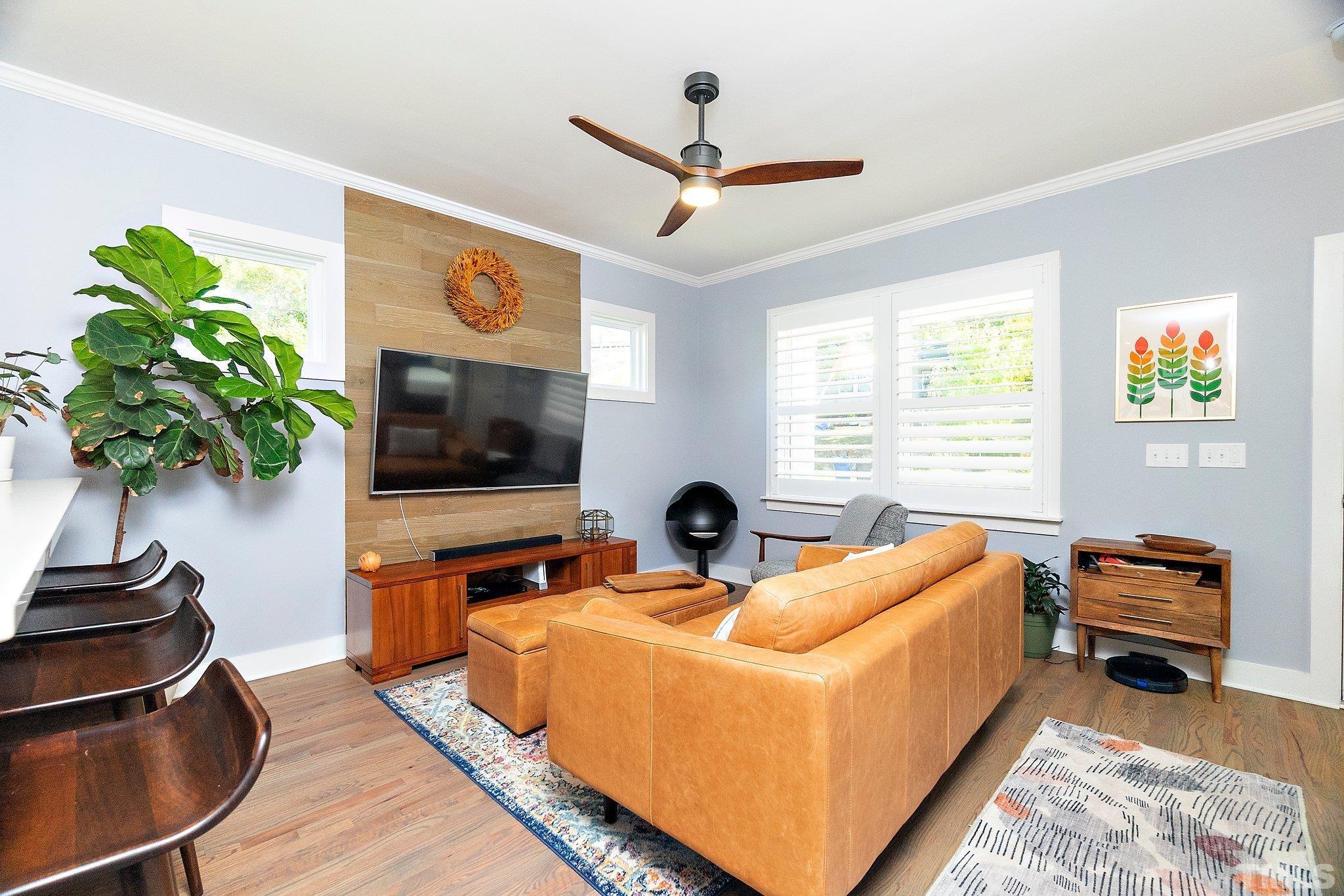 1510 Concord Street Durham, NC 27707 - Photo 3 of 17 a living room with furniture and a flat screen tv