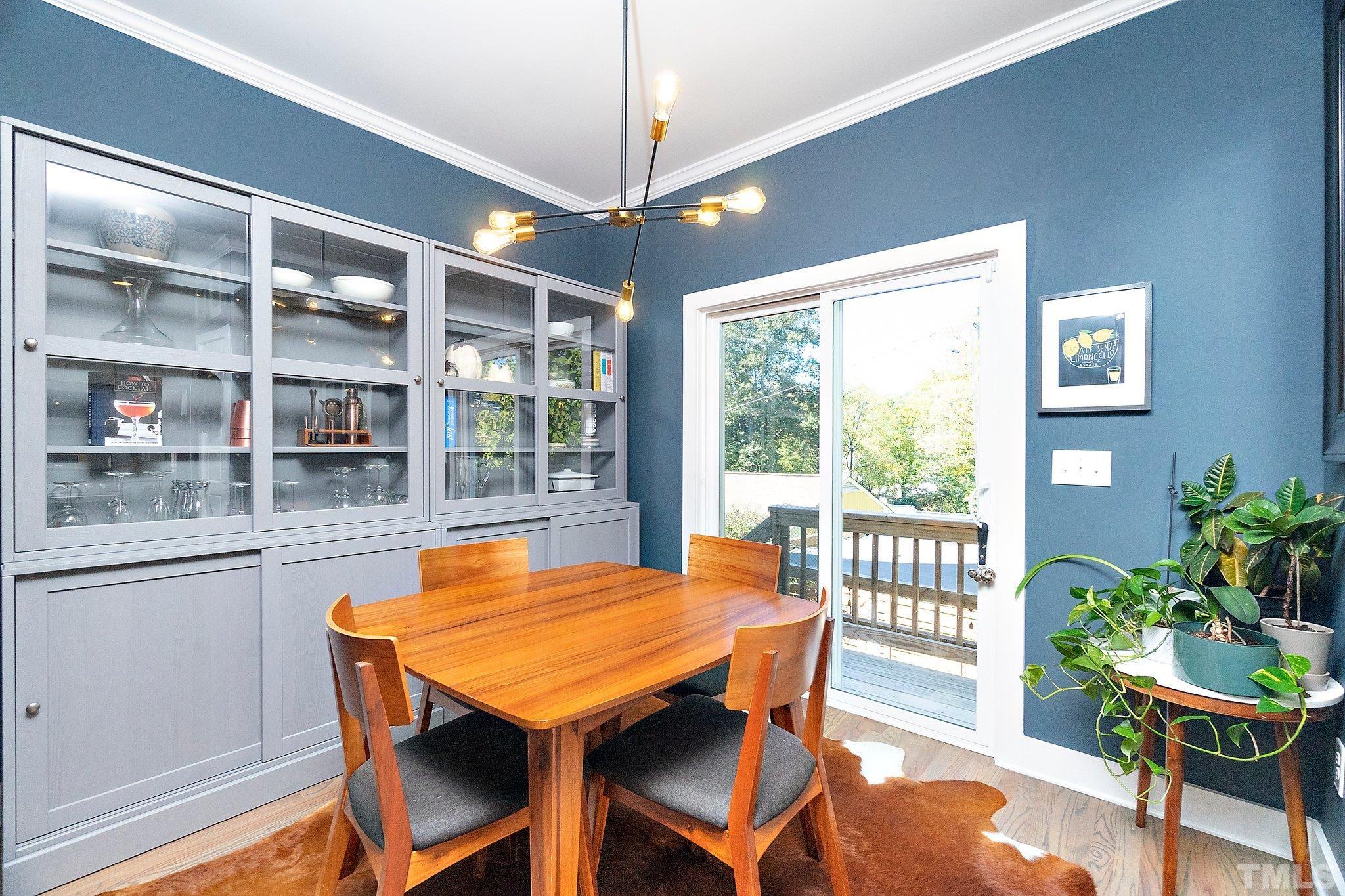 1510 Concord Street Durham, NC 27707 - Photo 7 of 17 a view of a dining room with furniture window and outside view