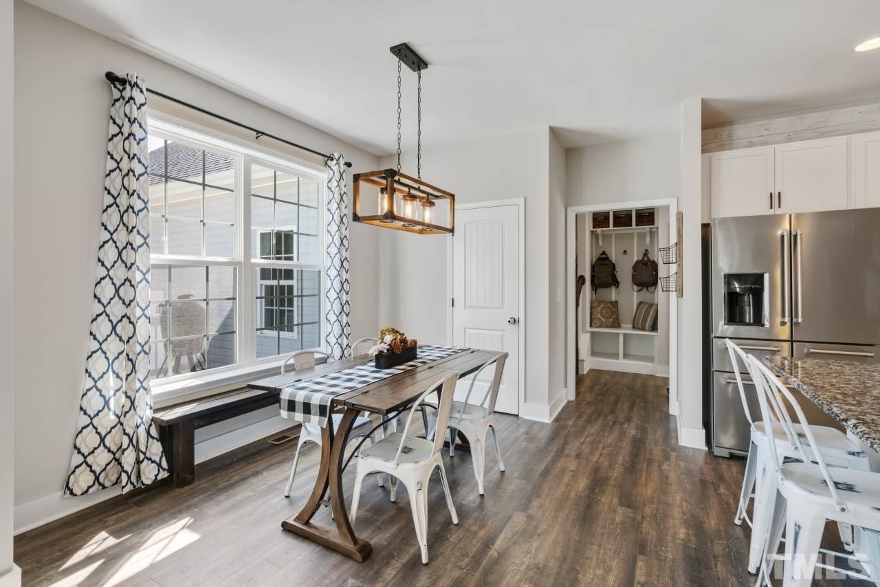 7255 Highway 231 Middlesex, NC 27557 - Photo 11 of 27 a patio with yard table and chairs