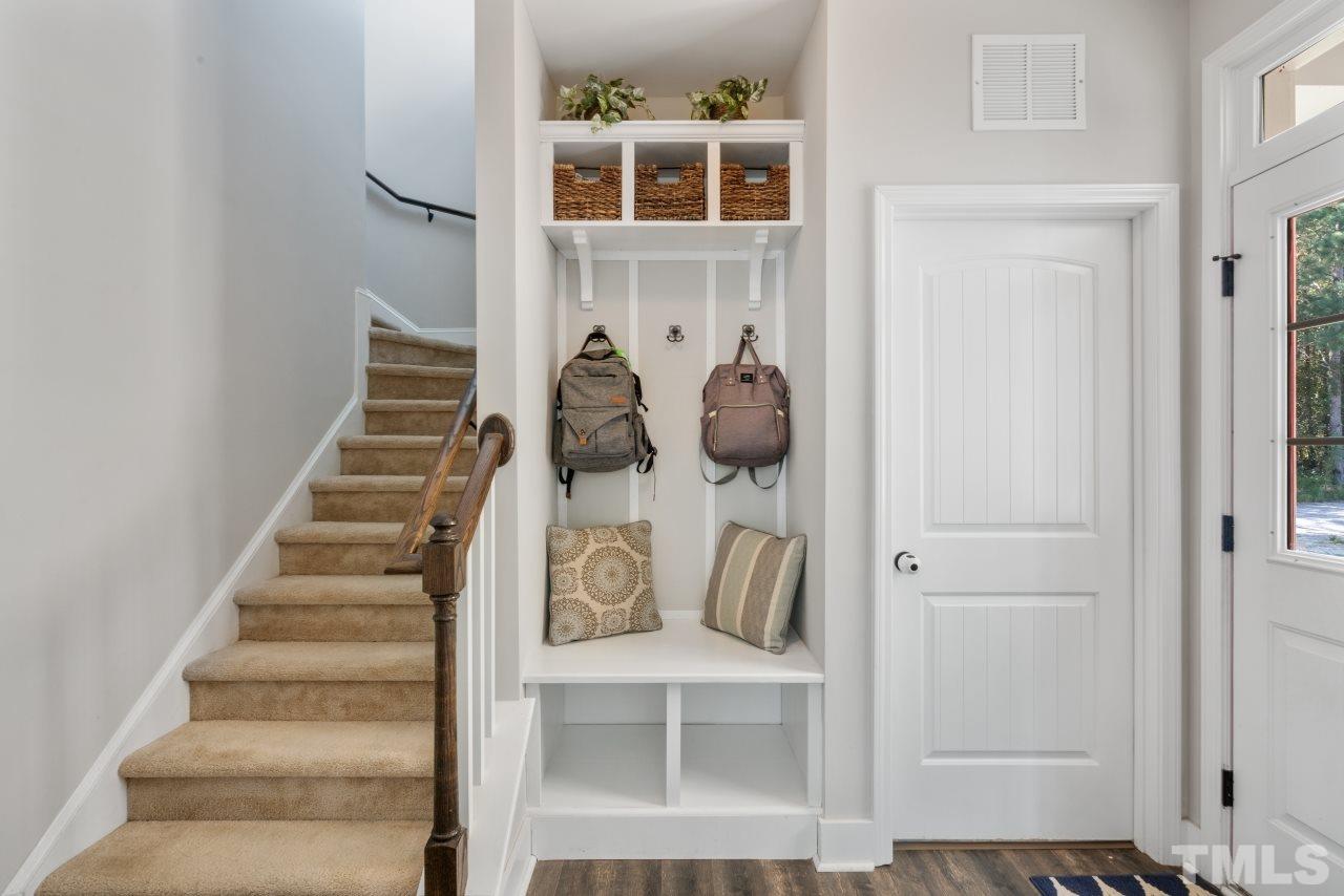7255 Highway 231 Middlesex, NC 27557 - Photo 12 of 27 a view of entryway and hall with wooden floor