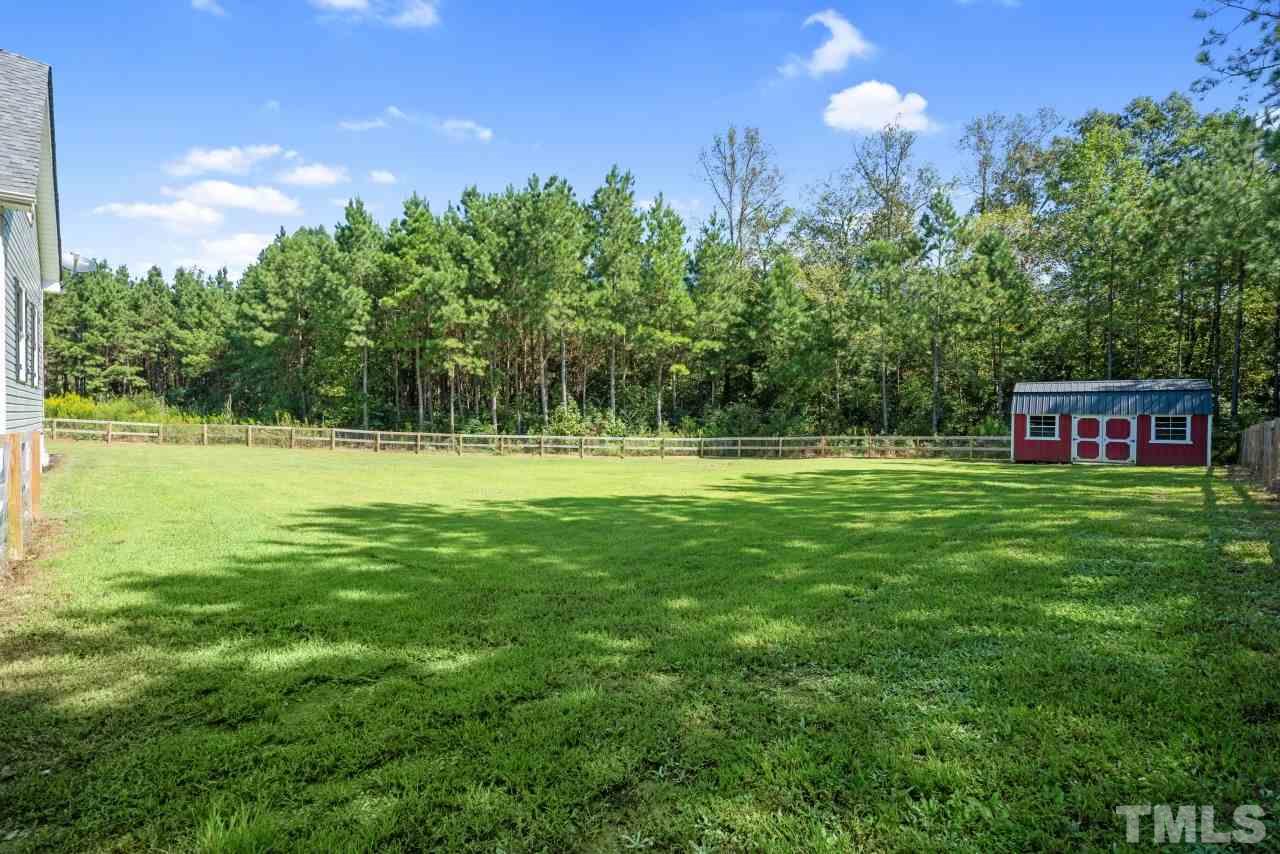 7255 Highway 231 Middlesex, NC 27557 - Photo 22 of 27 a view of a golf course with a play ground