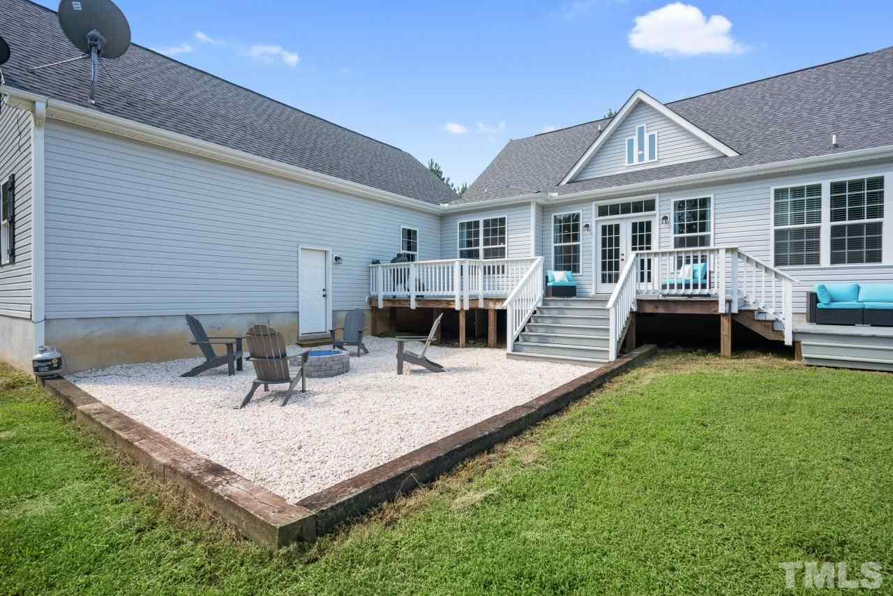 7255 Highway 231 Middlesex, NC 27557 - Photo 24 of 27 a dining room with furniture and garden view