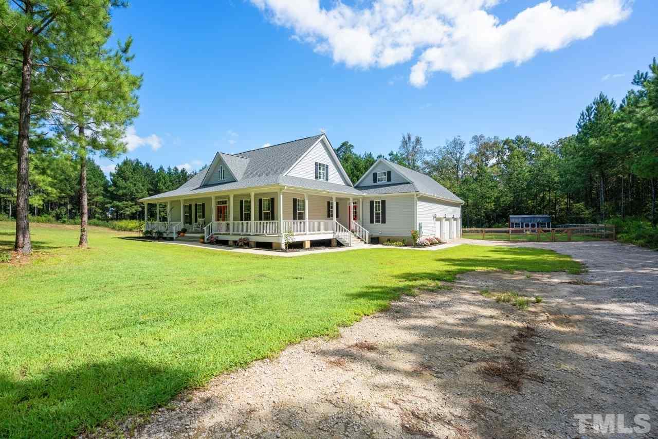 7255 Highway 231 Middlesex, NC 27557 - Photo 4 of 27 a view of a house with a big yard