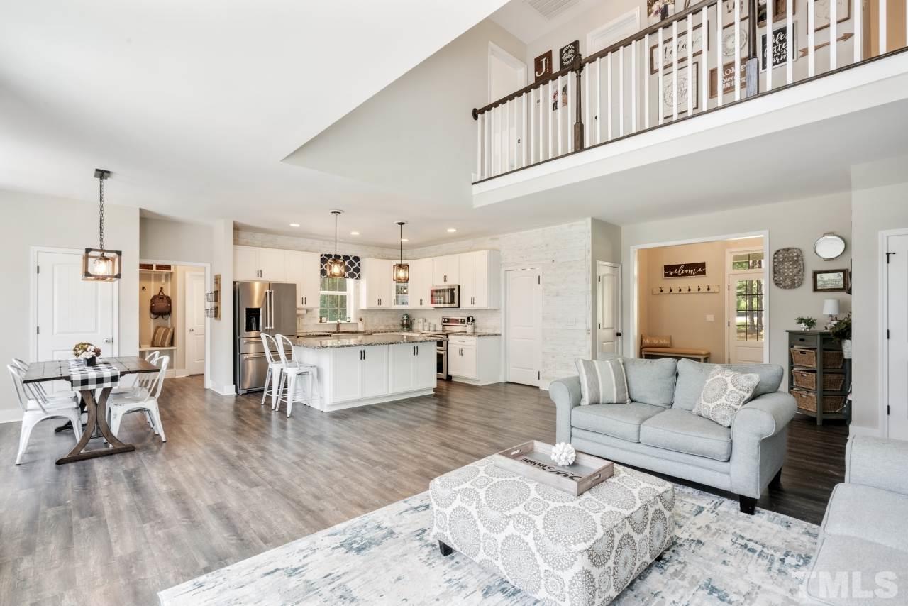 7255 Highway 231 Middlesex, NC 27557 - Photo 7 of 27 a living room with furniture and kitchen view