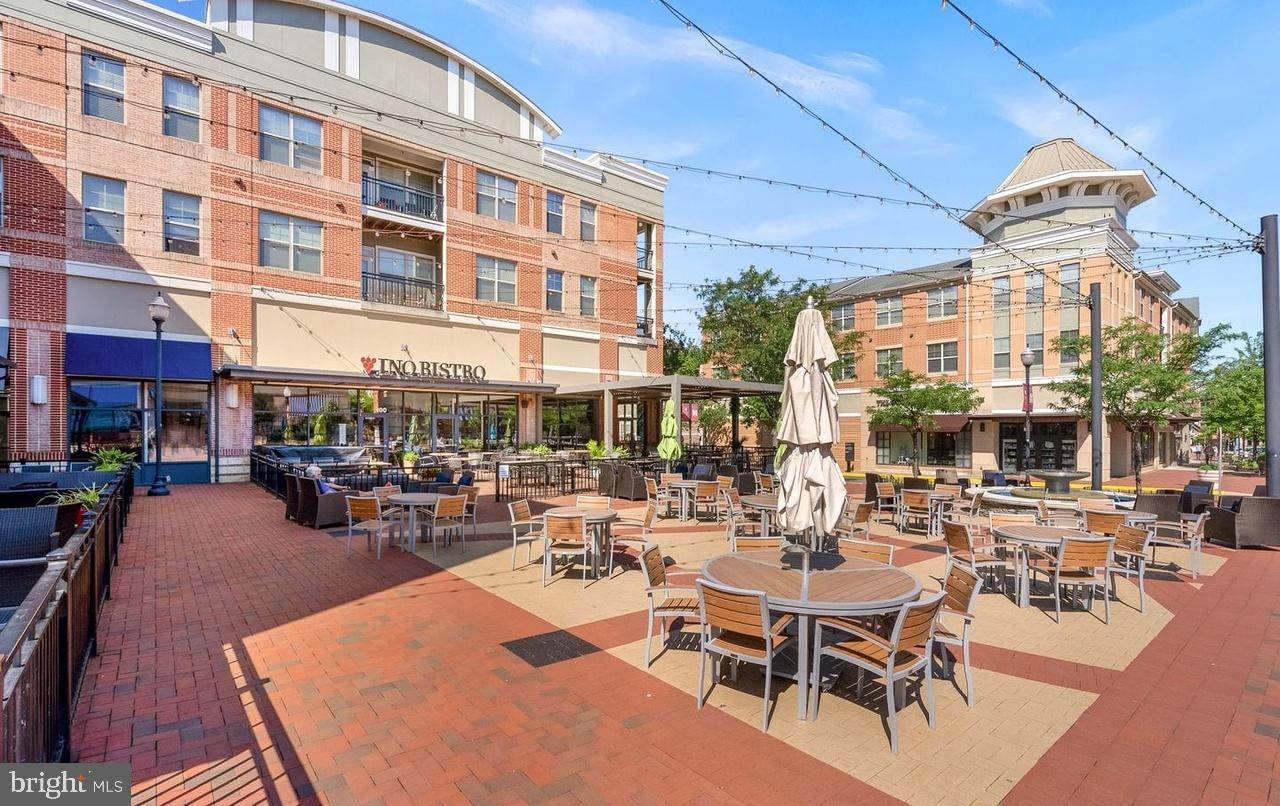 1426 Ribbon Limestone Terrace Southeast Leesburg, VA 20175 - Photo 39 of 43 Charming outdoor dining in a vibrant plaza.