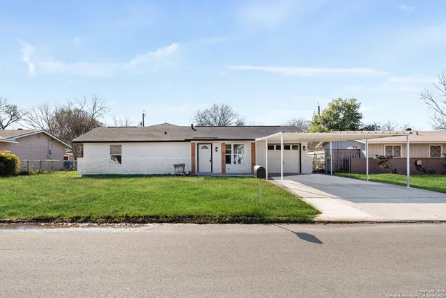 a house view with a garden space