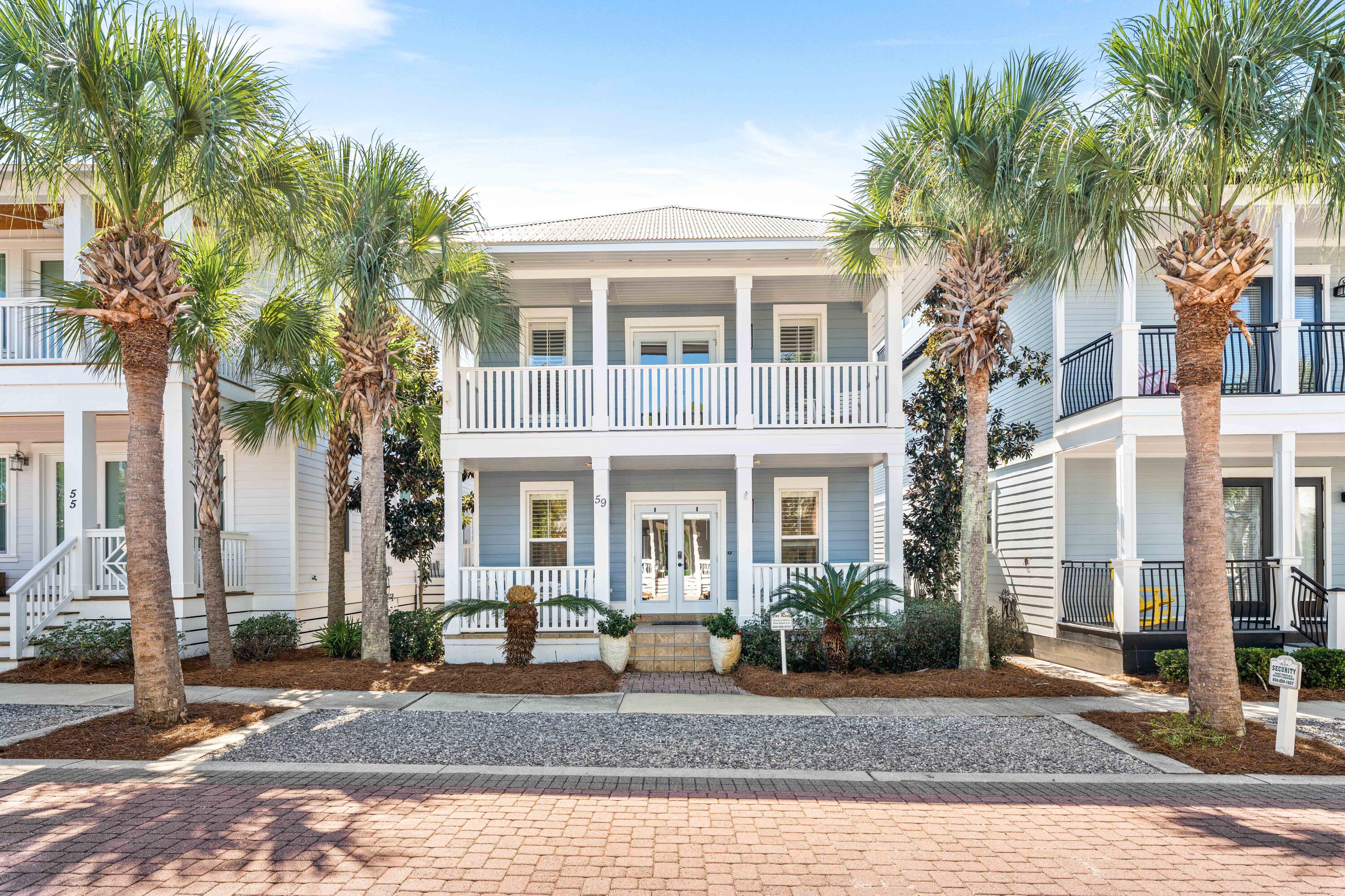 59 Endless Summer Way West Inlet Beach, FL 32461 - Photo 1 of 40 a front view of a house with garden