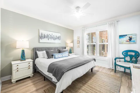 a bedroom with a bed and a table