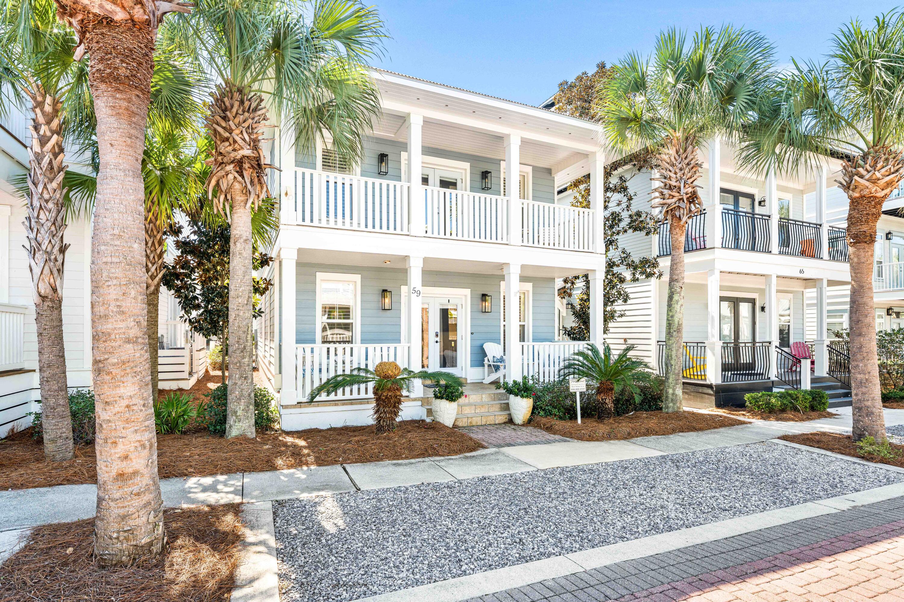 59 Endless Summer Way West Inlet Beach, FL 32461 - Photo 39 of 40 a front view of a building with garden