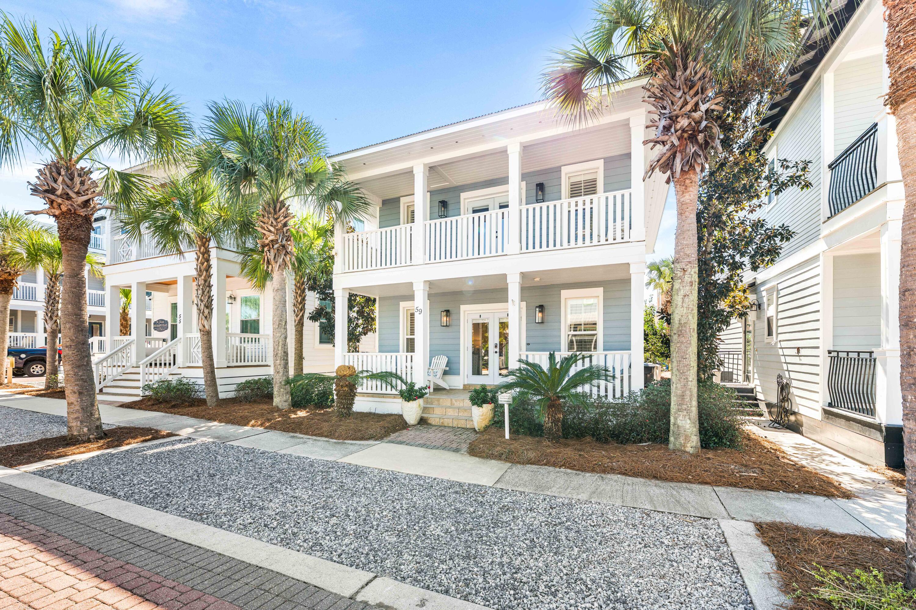 59 Endless Summer Way West Inlet Beach, FL 32461 - Photo 40 of 40 a front view of a building with garden