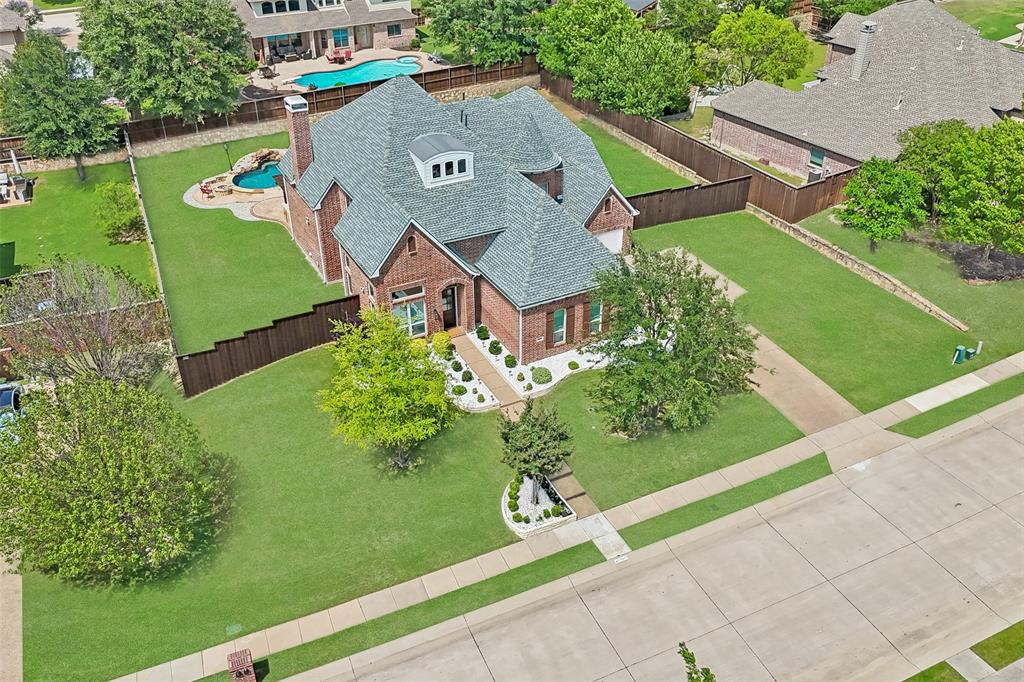 1011 Three Rivers Drive Prosper, TX 75078 - Photo 5 of 27 Stunning aerial view showcasing the expansive lot, sparkling pool, and generous outdoor space.