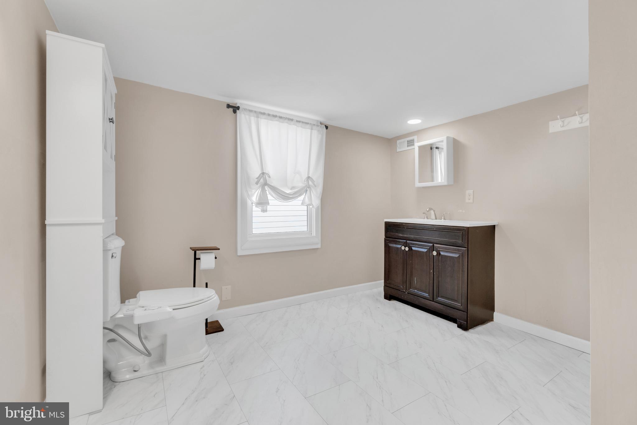 19 Pleasant Street Southampton, NJ 08088 - Photo 12 of 23 a view of an empty room with a window