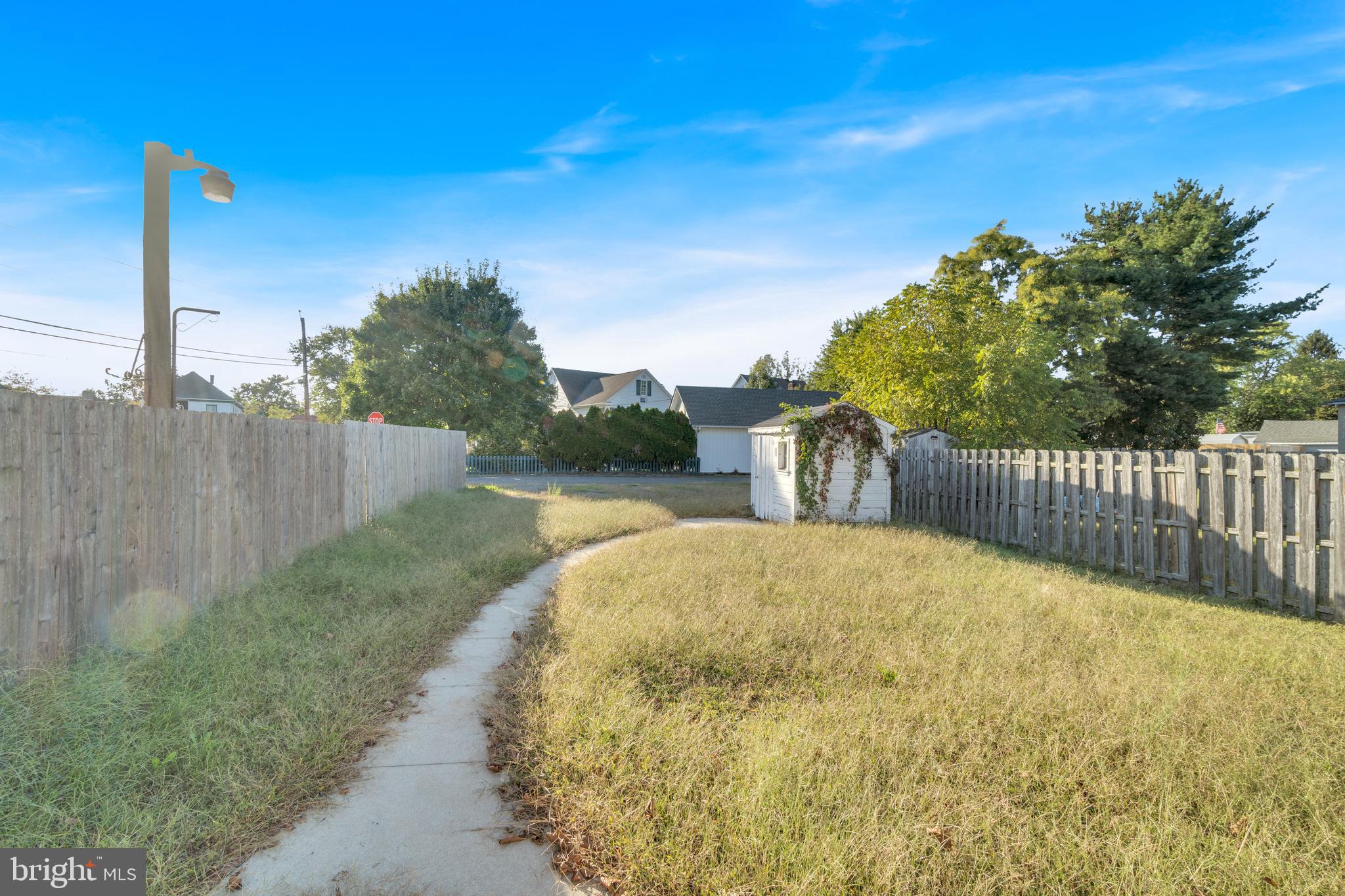 19 Pleasant Street Southampton, NJ 08088 - Photo 19 of 23 a view of a garden with wooden fence