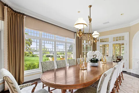 a living room with furniture or outdoor view and a large window