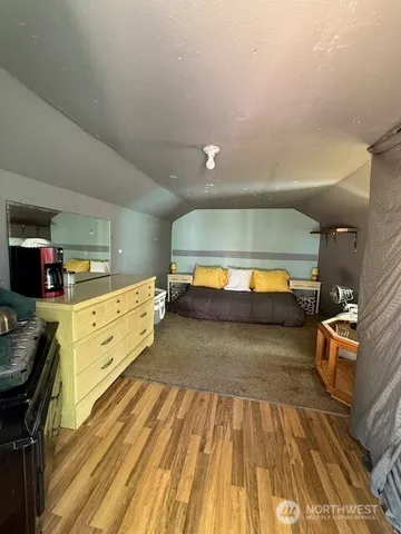 a spacious bathroom with a double vanity sink and a mirror