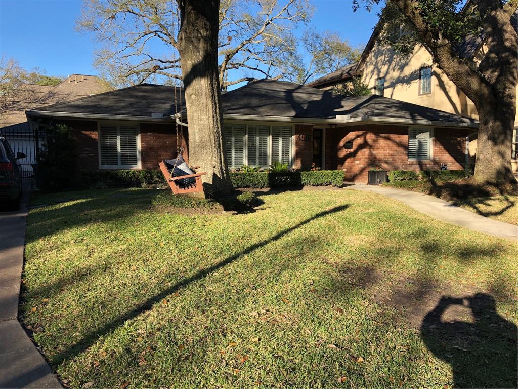 Front elevation - wonderful, light-filled, family home in exceptional, mid-block location. Walk to the best that Houston has to offer... world class dining and shopping at River Oaks District, The Galleria and Highland Village Retail.