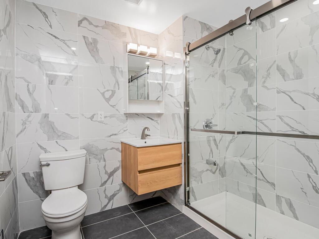 3641 Johnson Avenue, Unit B B Bronx, NY 10463 - Photo 1 of 3 a bathroom with a toilet and a shower